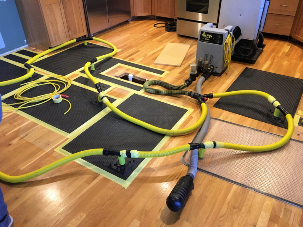 Drying equipment setup on hardwood floors